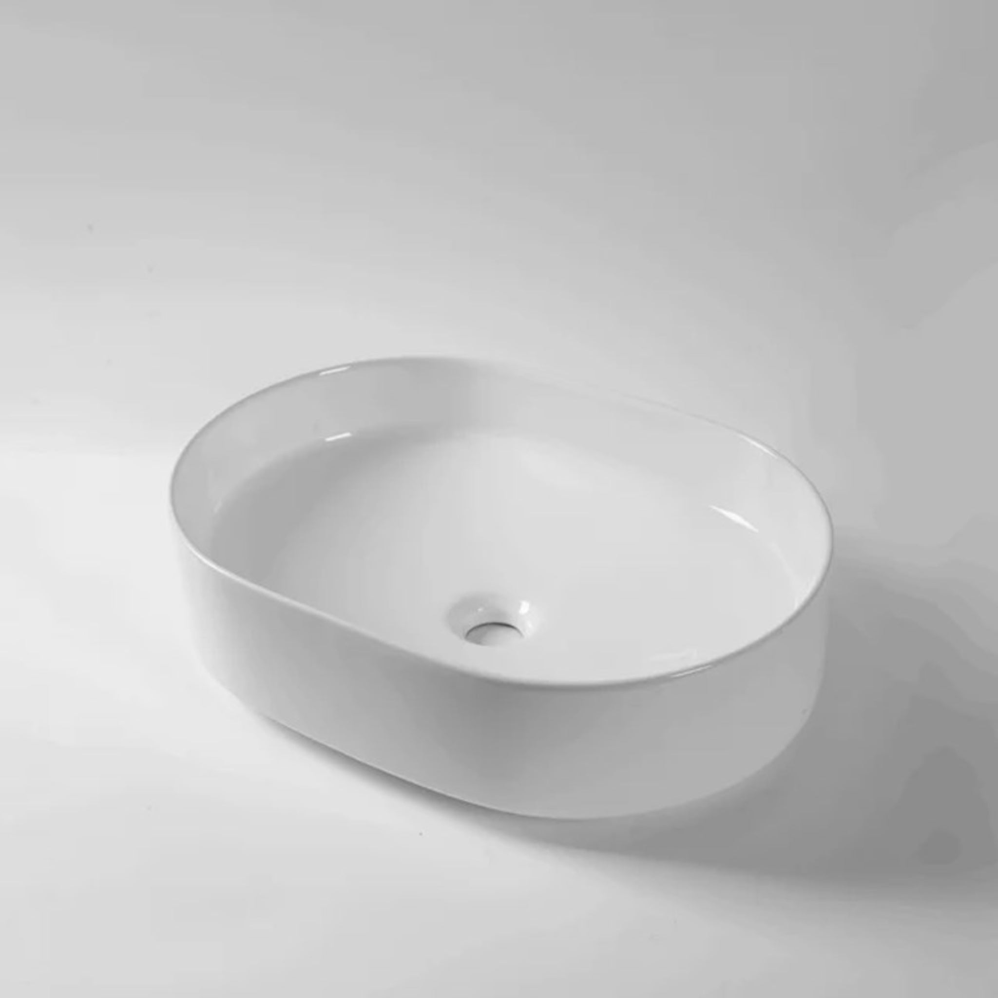 AQUAPERLA CERAMIC FLUTED OVAL ABOVE COUNTER BASIN GLOSS WHITE 500MM